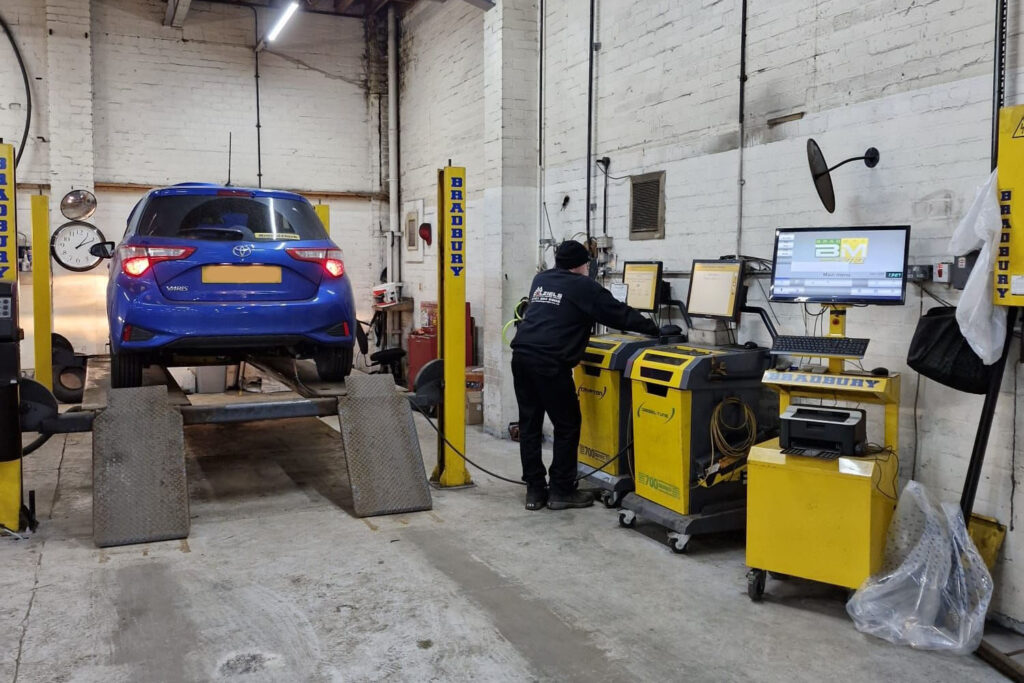 Blue car in MOT BAY ay Dalziels Garage